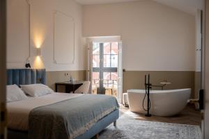 Postel nebo postele na pokoji v ubytování Hotel Boutique Las Indianas