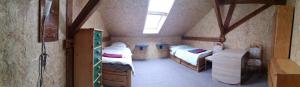 Katil atau katil-katil dalam bilik di Pension Dingolshausen