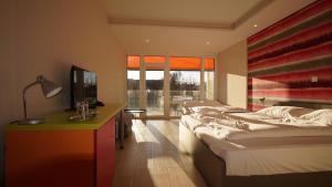 Posteľ alebo postele v izbe v ubytovaní Colors Holiday Hotel