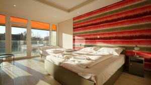 Postel nebo postele na pokoji v ubytování Colors Holiday Hotel + 37 fotografií