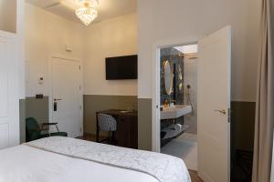 Postel nebo postele na pokoji v ubytování Hotel Boutique Las Indianas