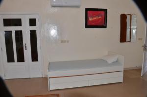 מיטה או מיטות בחדר ב-Villa Luxueuse à Ouakam