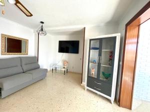 Televízia a/alebo spoločenská miestnosť v ubytovaní Apartamento Ocean 2 by Gestaltur