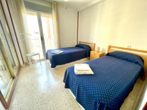 Posteľ alebo postele v izbe v ubytovaní Apartamento Ocean 2 by Gestaltur