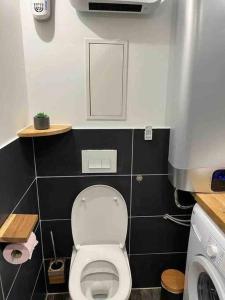 Koupelna v ubytování Escale Studio 21m Aéroport CDG Parc expo Astérix