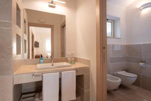 A bathroom at Gattarella Family Resort Puglia- Seaside Rooms and Suites with Premium Half-Board à la carte