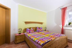 Кровать или кровати в номере Gästehaus Ehses