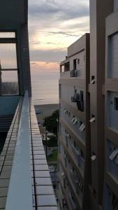 a view from the balcony of a building at Studio Frente à Praia Boqueirão in Santos