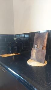 a kitchen counter with a counter top with a sink at Casa con pileta en Paso de la Patria in Paso de la Patria