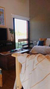 Ένα ή περισσότερα κρεβάτια σε δωμάτιο στο Casa con pileta en Paso de la Patria +26 φωτογραφίες