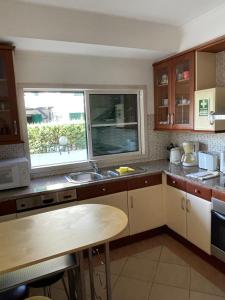 Kuchyň nebo kuchyňský kout v ubytování Casa Oliveiras