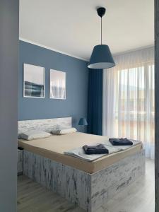 Легло или легла в стая в Blue loft & 2bedrooms & parking