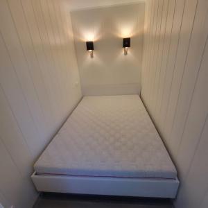 Ένα ή περισσότερα κρεβάτια σε δωμάτιο στο Eco apartment in Jurmala