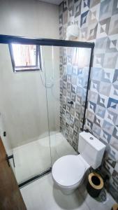 Koupelna v ubytování Vila Astra - jacuzzi privativa, natureza e conforto
