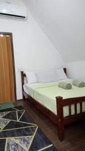 Een bed of bedden in een kamer bij Dewati B&B