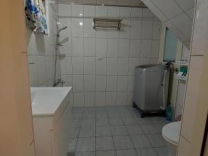 Koupelna v ubytování 南田旅宿