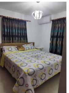 Postel nebo postele na pokoji v ubytování Flia Alcantara CG