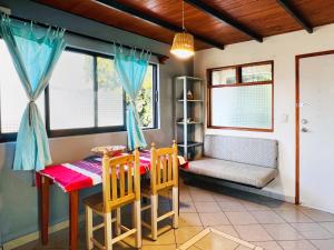 a dining room with a table and chairs and a couch at Departamento independiente Amueblado Tule Oaxaca room in Santa María del Tule +37 photos