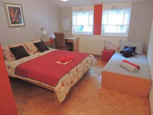 Postel nebo postele na pokoji v ubytování Apartment Alvarium