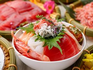 a bowl of food with seafood on a table at Atagawa Ocean Resort in Higashiizu +93 photos