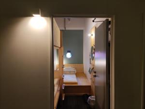 Postel nebo postele na pokoji v ubytování Hostel Tomar