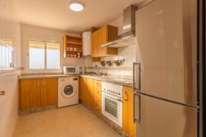 Kuchyň nebo kuchyňský kout v ubytování Apartamento con Terraza San Julian Cordoba