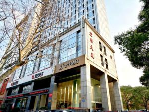 a building with a sign on the front of it at JI Hotel Nanjing Hongqiao Zhongshan North Road in Nanjing