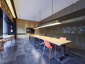 TV a/nebo společenská místnost v ubytování Hangzhou Futur Science andTechnoiogy CitiGO HuanGe Hotel