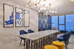 Posezení v ubytování Crystal Orange Hotel (Hangzhou Binjiang Star Avenue)