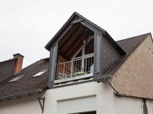 a balcony on the roof of a house at Pleasing Apartment in Traben Trarbach with Balcony in Wolf