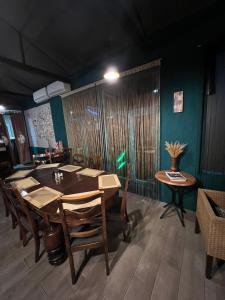 Area soggiorno di Green Flower Hotel