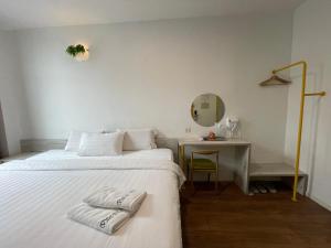 Postel nebo postele na pokoji v ubytování Vrest Hotel