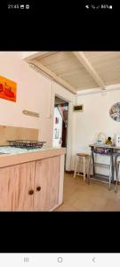 Kuchyň nebo kuchyňský kout v ubytování Chambre D'hote PLACE DES AMOUREUX