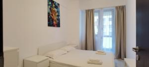 Postel nebo postele na pokoji v ubytování Cozy Accommodation Central City - Iasi