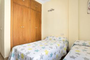 Posteľ alebo postele v izbe v ubytovaní Apartamento El Tajo