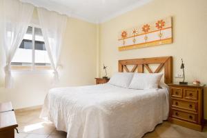 Posteľ alebo postele v izbe v ubytovaní Apartamento El Tajo