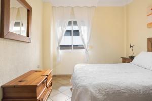 Posteľ alebo postele v izbe v ubytovaní Apartamento El Tajo
