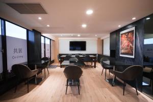 Hub Hotel - Songshan Airport Branchにあるテレビまたはエンターテインメントセンター