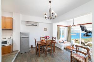 Kuchyň nebo kuchyňský kout v ubytování Kounenos Apartments
