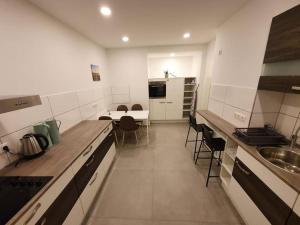 Kuchyň nebo kuchyňský kout v ubytování WoHntel Hannover Ricklingen