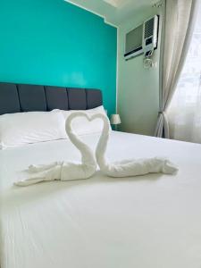 Ένα ή περισσότερα κρεβάτια σε δωμάτιο στο Functional 1-br Space in Amaia with Fast Internet