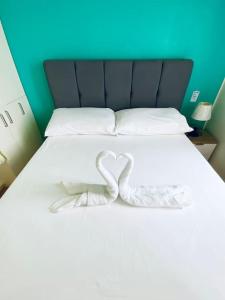 Ένα ή περισσότερα κρεβάτια σε δωμάτιο στο Functional 1-br Space in Amaia with Fast Internet
