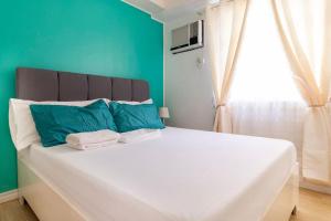 Ένα ή περισσότερα κρεβάτια σε δωμάτιο στο Functional 1-br Space in Amaia with Fast Internet