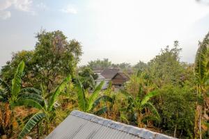 a view of a village from the roof of a house at OYO 1784 Hj. Aniek Residence in Madiun