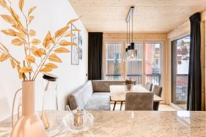 Posezení v ubytování Ferienwohnung Family Plus zentral by A-Appartments