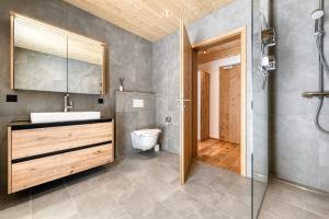 Koupelna v ubytování Ferienwohnung Family Plus zentral by A-Appartments + 28 fotografií