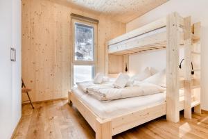 Postel nebo postele na pokoji v ubytování Ferienwohnung Family Plus zentral by A-Appartments