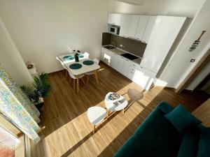 Kuchyň nebo kuchyňský kout v ubytování Apartment Escape + 21 fotografií