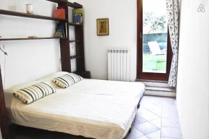 Posteľ alebo postele v izbe v ubytovaní Tra Gli Olivi E La Riviera Del Conero
