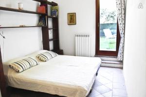 מיטה או מיטות בחדר ב-Tra Gli Olivi E La Riviera Del Conero